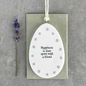 Porcelain Flat Hanging Egg with message 'Happiness is time spent with a friend'