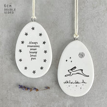 Load image into Gallery viewer, Porcelain Flat Hanging Egg with message &#39;Always remember some bunny loves you&#39;