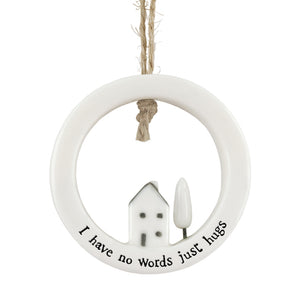 East of India Porcelain Round Hanger with mini house and 'No words just hugs'