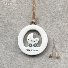 Load image into Gallery viewer, East of India Porcelain Cut Out New Baby Hanger 'Welcome'