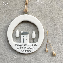 Load image into Gallery viewer, East of India Porcelain Cut Out Hanger 'Seasons may come and go but friendships last foever'